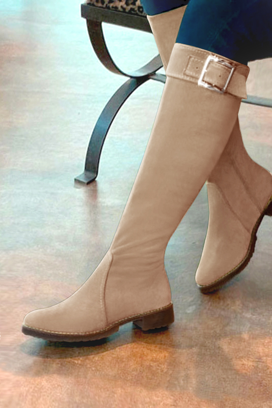 French elegance and refinement for these tan beige riding knee-high boots, 
                available in many subtle leather and colour combinations. Record your foot and leg measurements.
We will adjust this pretty boot with zip to your measurements in height and width.
Its large, comfortable gum sole will isolate you from the ground.
You can customise the boot with your own materials, colours and heels on the "My Favourites" page.
To style your boots, accessories are available from the boots page. 
                Made to measure. Especially suited to thin or thick calves.
                Matching clutches for parties, ceremonies and weddings.   
                You can customize these knee-high boots to perfectly match your tastes or needs, and have a unique model.  
                Choice of leathers, colours, knots and heels. 
                Wide range of materials and shades carefully chosen.  
                Rich collection of flat, low, mid and high heels.  
                Small and large shoe sizes - Florence KOOIJMAN